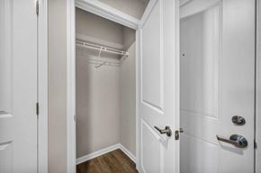 Parma apartment for rent - a closet in a bedroom with a door open to it