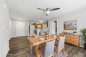Columbus apartment for rent - A dining room with a wooden table and chairs.