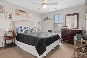 Roanoke Rapids apartment for rent - a bedroom with a bed and a dresser