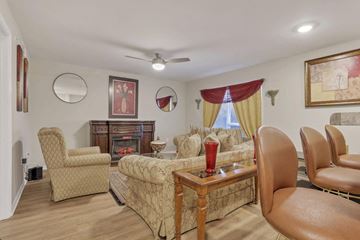 Columbus apartment for rent - a living room with a couch and chairs and a fireplace
