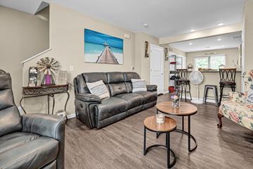 Lewisberry apartment for rent - a living room with leather couches and a table