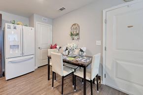 Calabash apartment for rent - a dining room with a table and chairs