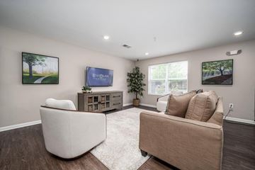 Charlotte apartment for rent - a living room with a couch and a tv