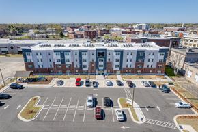 Rocky Mount apartment for rent - an aerial view of an apartment building in a parking lot