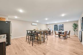 Hendersonville apartment for rent - A kitchen with a dining table and chairs.