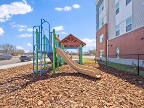 Rocky Mount apartment for rent - a playground with a slide at an apartment complex
