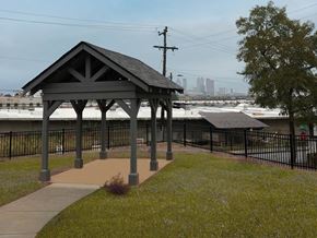 Atlanta apartment for rent - a gazebo with a view of the water and a city in the