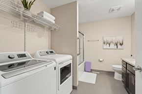 Cedar Rapids apartment for rent - A laundry room with a washer and dryer.