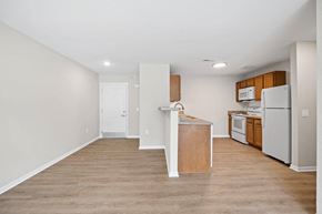 Charleston apartment for rent - a kitchen with an island and a white refrigerator