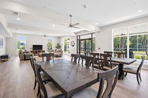 Hebron apartment for rent - a large dining room with a large wooden table and chairs