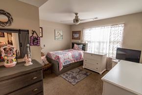 Kingstree apartment for rent - a bedroom with a bed and a dresser