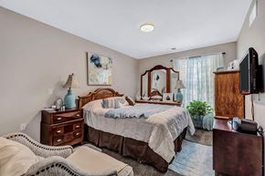 Dayton apartment for rent - a bedroom with two beds and a dresser