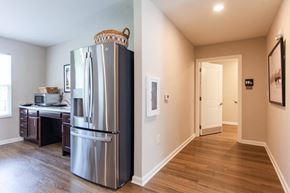 New Bern apartment for rent - a kitchen with a stainless steel refrigerator