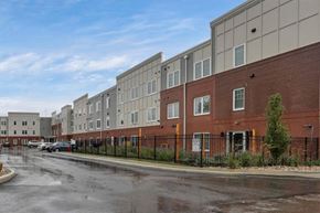 Columbus apartment for rent - an empty parking lot in front of an apartment building