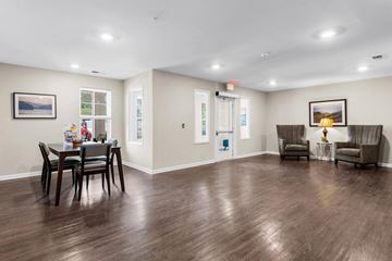 Hickory apartment for rent - a living room and dining room with a table and chairs