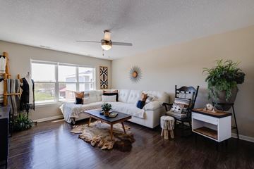 Johnston apartment for rent - a living room with a couch and a table