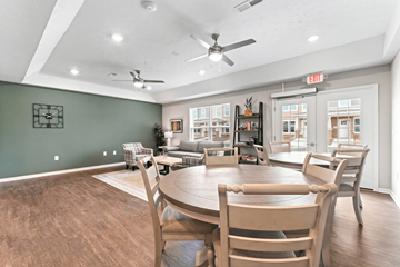 Noblesville apartment for rent - a dining room and living room with a table and chairs