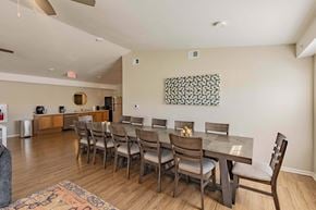 Athens apartment for rent - A dining room with a table set for six.