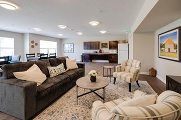 Indianola apartment for rent - a living room with a couch and a table