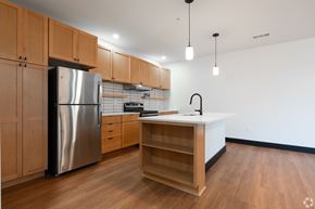 Louisville apartment for rent - Kitchen with stainless steel refrigerator at The Yard Apartments, Louisville, 40202