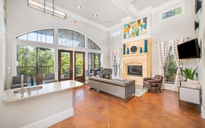 Austin apartment for rent - A living room with a fireplace and a television.