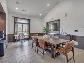 Indian Land apartment for rent - a dining room with a wooden table and chairs