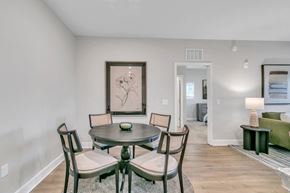 Cartersville apartment for rent - A dining room with a table and chairs.