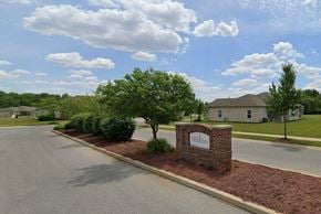 Fort Wayne triplex for rent - A sign in front of a building that says "Welcome to the community".