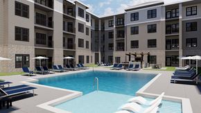 Arden apartment for rent - A large swimming pool is surrounded by lounge chairs and umbrellas in front of a building.
