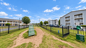 Myrtle Beach apartment for rent - Fenced dog park with an agility ramp and pet waste station at Canterbury Apartments in Myrtle Beach, SC.