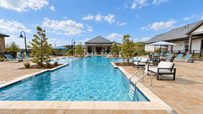 Cartersville apartment for rent - Swimming pool with lounge chairs and poolside clubhouse at The View on Canton in Cartersville, GA.