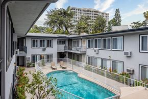 Los Angeles apartment for rent - a view of the pool and pool house from the balcony