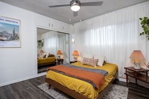 Los Angeles apartment for rent - a bedroom with a bed and a ceiling fan