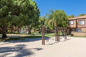 Fontana apartment for rent - a playground in a park in front of a building