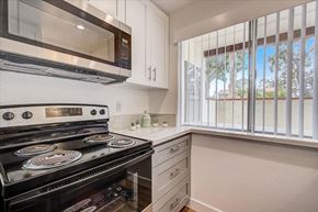 Carson apartment for rent - a kitchen with a stove and a microwave