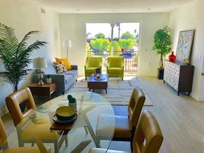 Reseda apartment for rent - A modern dining room with a glass table and chairs.