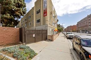 Los Angeles apartment for rent - A building with a sign that says "Leasing" on it.