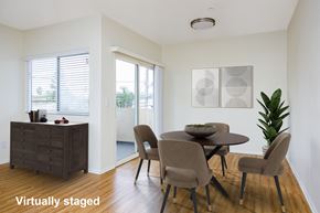 Los Angeles apartment for rent - A dining room with a table set for four.