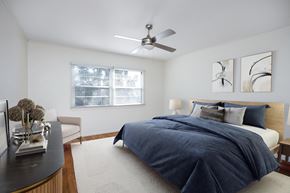 Los Angeles apartment for rent - a bedroom with a bed and a ceiling fan