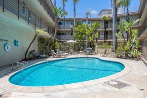 Los Angeles apartment for rent - a swimming pool with a building in the background
