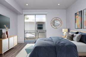 Los Angeles apartment for rent - a bedroom with a bed and a sliding glass door