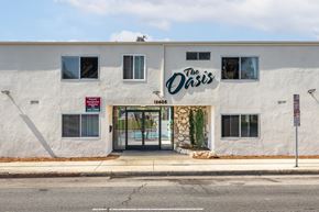 Gardena apartment for rent - the oasis building on the corner of a street