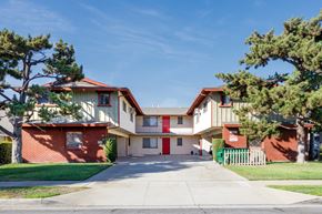 Arcadia apartment for rent - a street view of an apartment building with a driveway