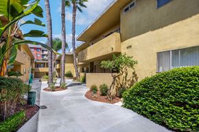 Inglewood apartment for rent - A sunny day at the apartment complex with a clear blue sky.