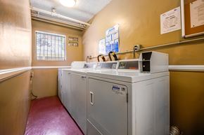 Inglewood apartment for rent - A laundry room with a washer and dryer.