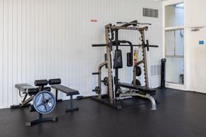 Van Nuys apartment for rent - a home gym with weights and cardio equipment