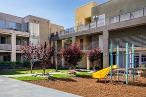 Northridge apartment for rent - an outdoor playground in front of an apartment building