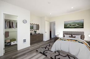 Redondo Beach apartment for rent - A bedroom with a large bed and a painting on the wall.