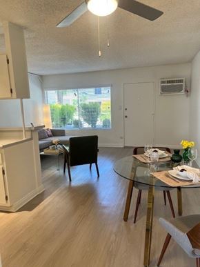 Sherman Oaks apartment for rent - A dining room with a glass table and chairs.