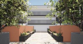 Los Angeles apartment for rent - a courtyard with trees and a building in the background